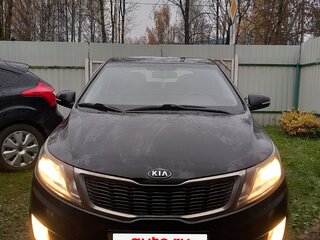 2012 Kia Rio 5-speed III, чёрный, 690000 рублей, вид 1