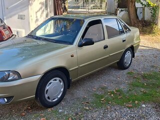 2010 Daewoo Nexia I Рестайлинг, золотистый, 180000 рублей, вид 2