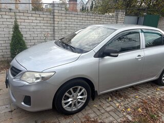 2010 Toyota Corolla X (E140, E150) Рестайлинг, серебристый, 1150000 рублей, вид 2