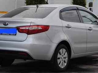 2014 Kia Rio 6-speed III, серебристый, 965000 рублей, вид 4