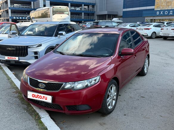2010 Kia Cerato 6-speed II, красный - вид 2