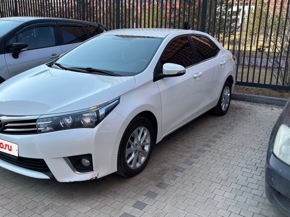 2014 Toyota Corolla XI (E160, E170, E180), белый, 1280000 рублей - вид 4
