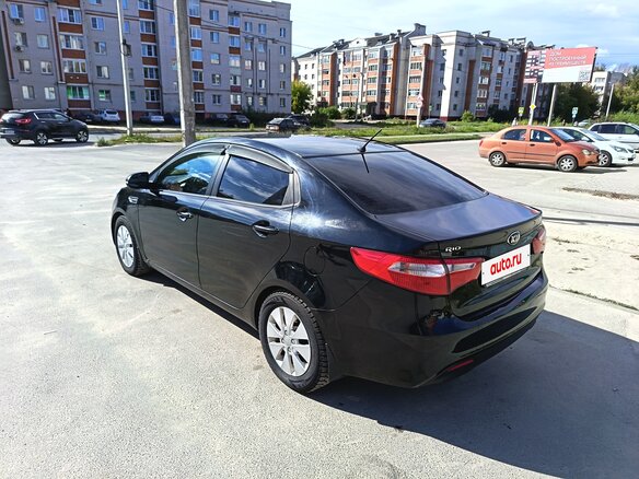 2014 Kia Rio 6-speed III, чёрный, 880000 рублей - вид 5