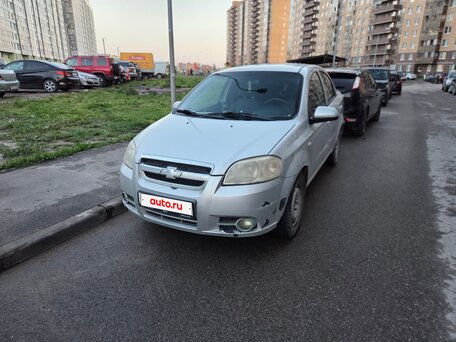 2011 Chevrolet Aveo I Рестайлинг, серебристый, 260000 рублей, вид 1