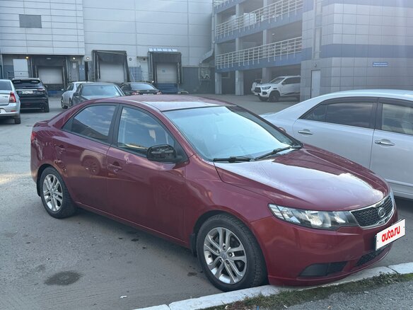 2010 Kia Cerato 6-speed II, красный - вид 1