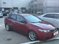 2010 Kia Cerato 6-speed II, красный - вид 1
