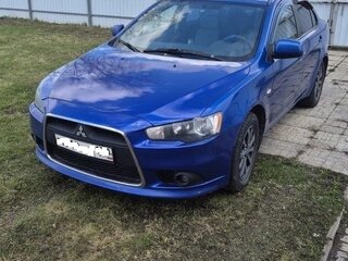 2011 Mitsubishi Lancer X Рестайлинг, синий, 595000 рублей, вид 1