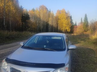 2012 Toyota Corolla X (E140, E150) Рестайлинг, серебристый, 950000 рублей, вид 1