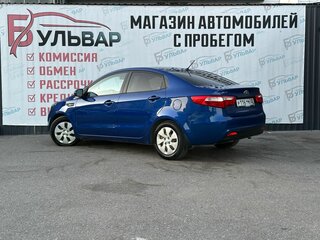 2013 Kia Rio 5-speed III, синий, 1100000 рублей, вид 4