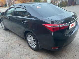 2014 Toyota Corolla XI (E160, E170, E180), чёрный, 1499000 рублей, вид 2