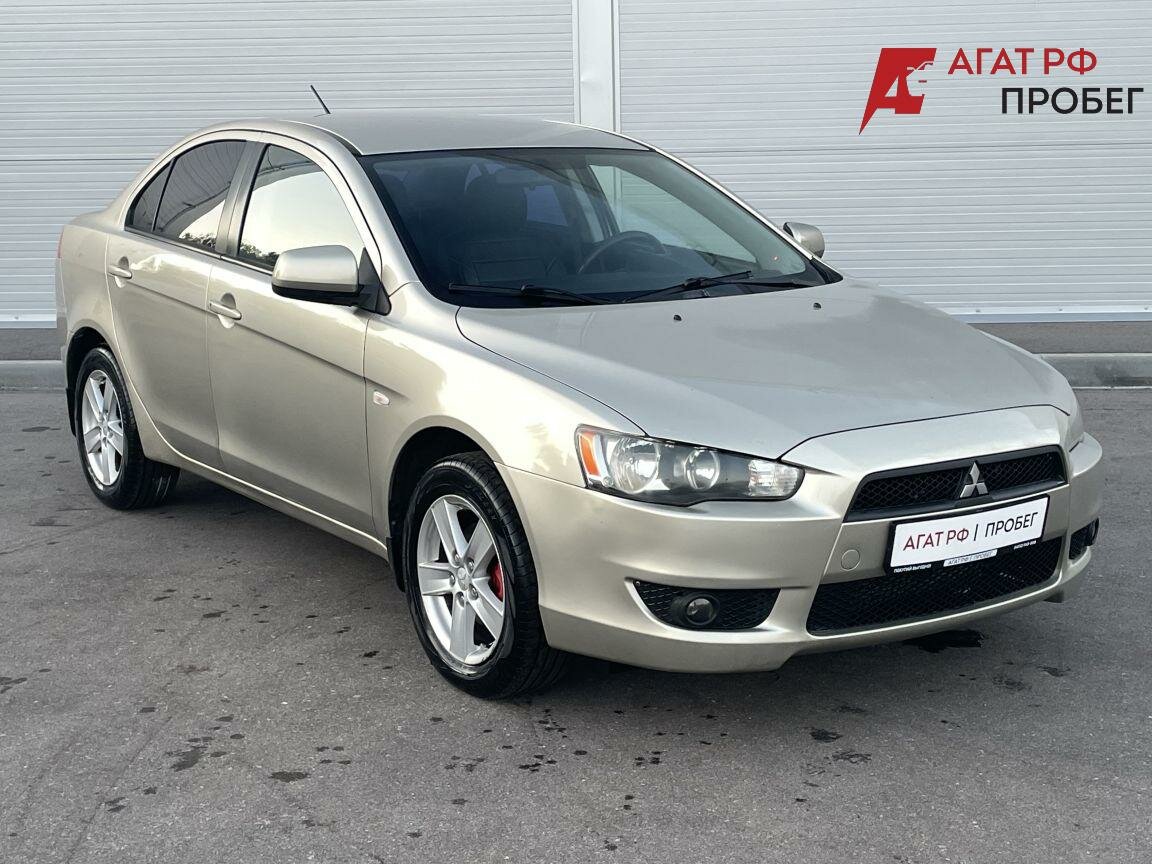 Открыть фотографии: Mitsubishi Lancer X