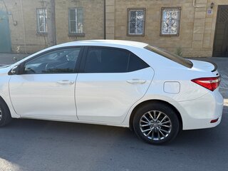2013 Toyota Corolla XI (E160, E170, E180), белый, 1090000 рублей, вид 4