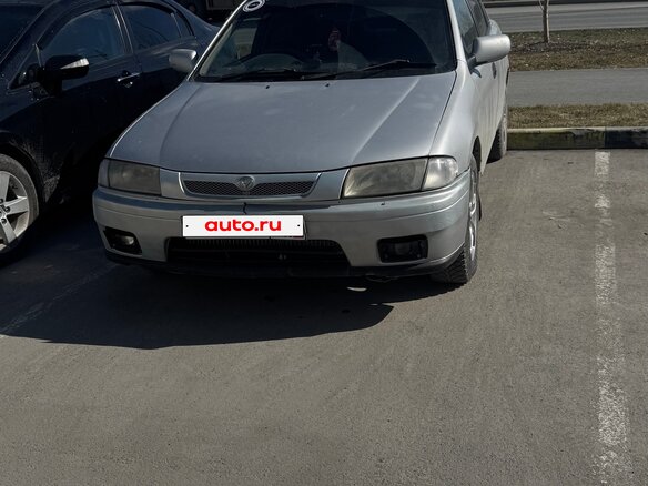 1997 Mazda Familia VII (BH), серебристый, 105000 рублей