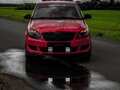 2013 Skoda Fabia II Рестайлинг, красный, 660000 рублей - вид 1