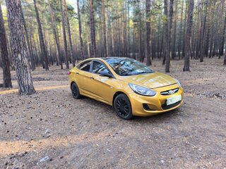 2012 Hyundai Solaris I, золотистый, 730000 рублей, вид 2