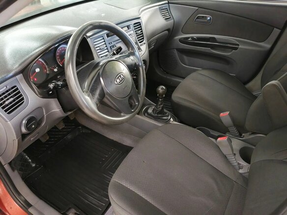 2010 Kia Rio II Рестайлинг, оранжевый - вид 13