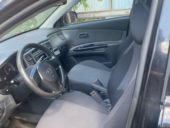 2011 Kia Rio II Рестайлинг, чёрный - вид 4