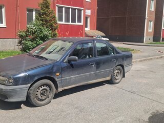 1992 Nissan Primera I (P10), синий, 60000 рублей, вид 1