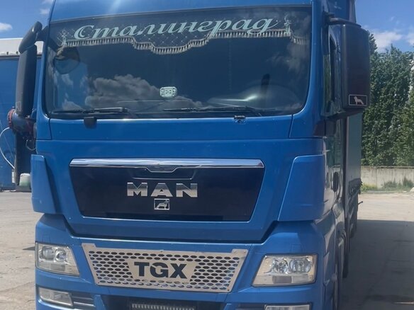 2009 MAN TGX, синий, 2600000 рублей - вид 3