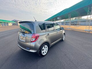 2009 Toyota Ractis I, коричневый, 858000 рублей, вид 3