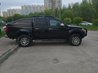 2006 Nissan Navara (Frontier) III (D40), чёрный, 960000 рублей, вид 3