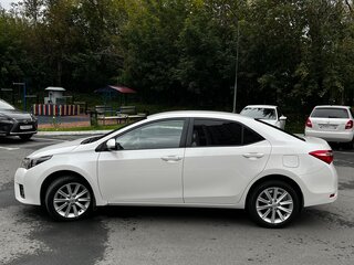 2013 Toyota Corolla XI (E160, E170, E180), белый, 1450000 рублей, вид 4