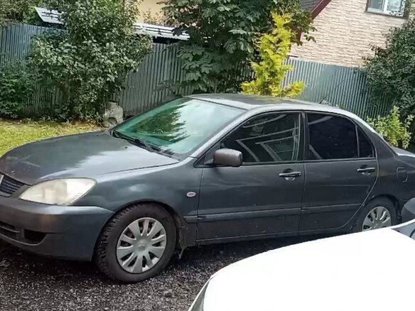 2009 Mitsubishi Lancer Classic IX Рестайлинг, серый, 255000 рублей