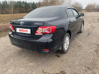2012 Toyota Corolla X (E140, E150) Рестайлинг, чёрный, 820000 рублей, вид 2