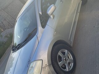 2007 Nissan Tiida I, серый, 520000 рублей, вид 4