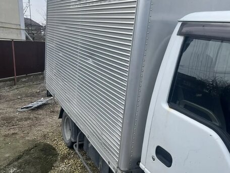1995 Isuzu Elf (N-series), белый, 850000 рублей, вид 3