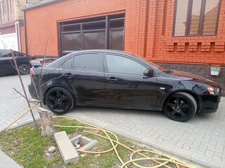 2010 Mitsubishi Lancer X, чёрный, 650000 рублей, вид 2