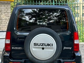 2011 Suzuki Jimny III Рестайлинг 1, чёрный, 850000 рублей, вид 2
