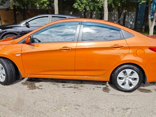 2015 Hyundai Solaris I Рестайлинг, оранжевый, 750000 рублей, вид 3