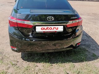 2014 Toyota Corolla XI (E160, E170, E180), чёрный, 1950000 рублей, вид 2