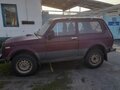 2001 Lada (ВАЗ) 2121 (4x4) I Рестайлинг, пурпурный, 300000 рублей - вид 4