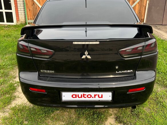 2008 Mitsubishi Lancer X, чёрный, 700000 рублей - вид 2