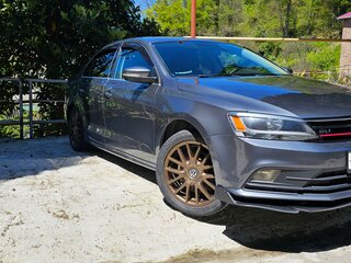 2015 Volkswagen Jetta VI Рестайлинг, серый, 1520000 рублей, вид 2