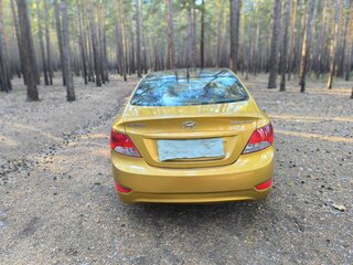 2012 Hyundai Solaris I, золотистый, 730000 рублей, вид 5