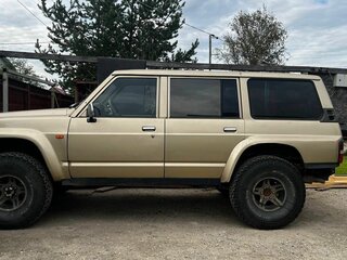 1991 Nissan Patrol IV (Y60), бежевый, 950000 рублей, вид 4