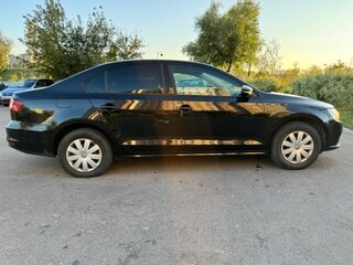 2016 Volkswagen Jetta VI Рестайлинг, чёрный, 1000000 рублей, вид 4