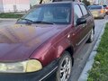 2006 Daewoo Nexia I, красный, 100000 рублей