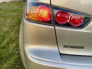 2010 Mitsubishi Lancer X, бежевый, 750000 рублей, вид 5