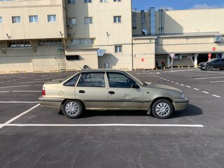 2006 Daewoo Nexia I, золотистый, 169000 рублей, вид 5