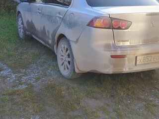 2010 Mitsubishi Lancer X, серебристый, 720000 рублей, вид 3