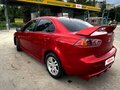2012 Mitsubishi Lancer X Рестайлинг, красный, 1050000 рублей - вид 5