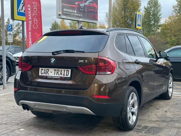 2014 BMW X1 20i I (E84) Рестайлинг, коричневый, 1400000 рублей - вид 4