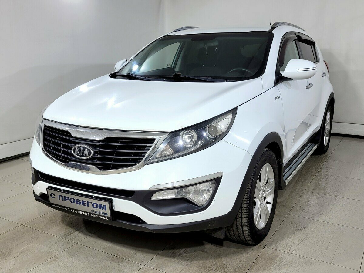 Открыть фотографии: Kia Sportage III