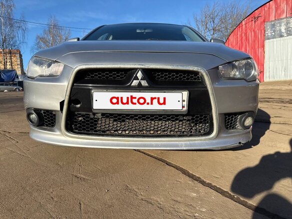 2012 Mitsubishi Lancer X Рестайлинг, серебристый, 950000 рублей - вид 1