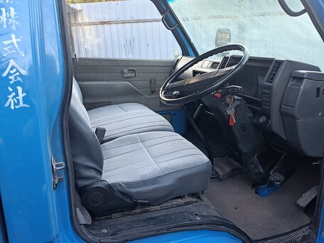 1989 Isuzu Elf (N-series), голубой, 720000 рублей, вид 2