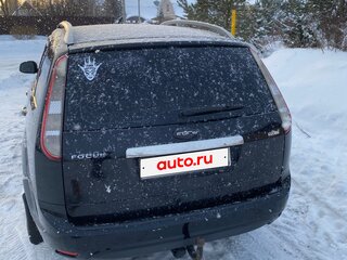 2010 Ford Focus II Рестайлинг, чёрный, 575000 рублей, вид 3